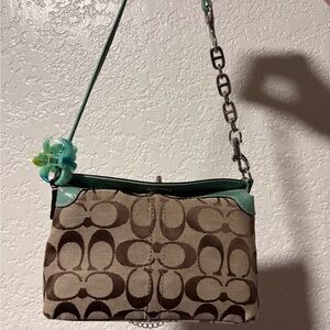 Brown Signature Pattern turn lock bag